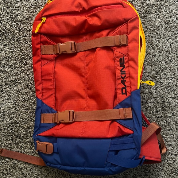 Dakine 18L backpack.